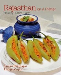 Book cover of Rajasthan On A Platter: Healthy, Tasty, Easy, with five stuffed green chilies. Published by Niyogi.