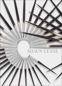 Book cover of Shaun Leane, with a large metal and wood spike ear cuff. Published by ACC Art Books.
