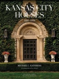 Book cover of Kansas City Houses 1885-1938, with an elaborate stone archway with wall covered in green ivy. Published by Bauer and Dean Publishers.