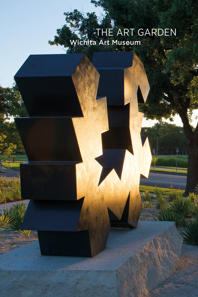 Large jagged edge sculpture on grey plinth in garden with trees, The Art Garden Wichita Art Museum in white font above