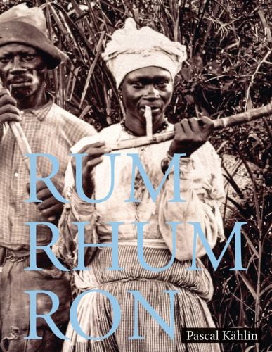 2 black figures chewing bamboo cane, RUM RHUM RON in blue font to lower centre.
