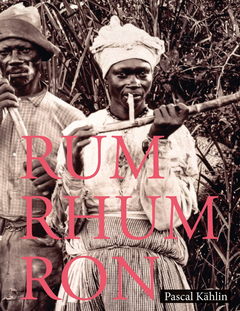 2 black figures chewing bamboo cane, RUM-RHUM-RON in pink font to lower centre.