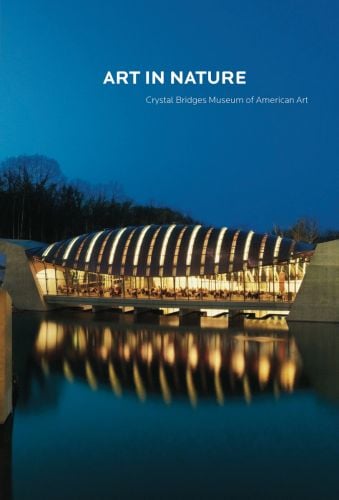 Crystal Bridges Museum of American Art under evening sky, reflection of structure in water, Art in Nature in white font above