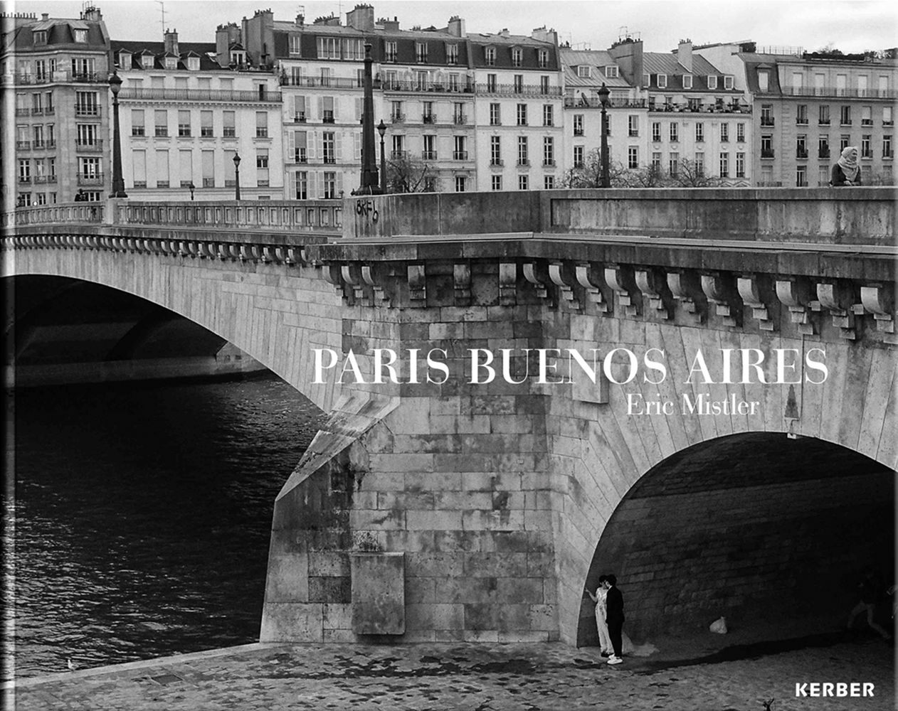 River Seine bridge with couple embracing beneath, PARIS BUENOS AIRES Eric Mistler in white font to centre.