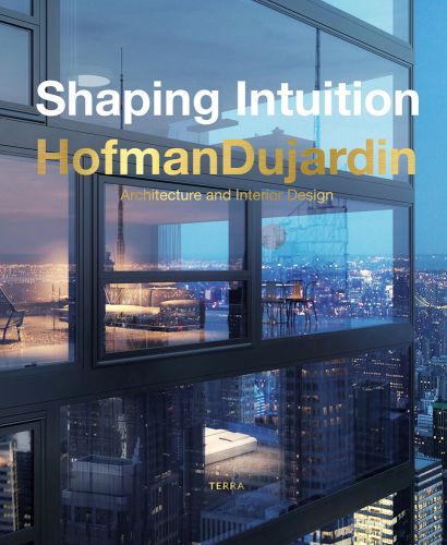 Tall glass building with a city skyline in the background on cover of 'Shaping Intuition, Architecture and Interior Design by HofmanDujardin', by Lannoo Publishers.