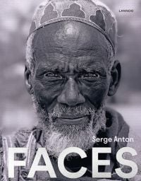 Black and white portrait of African man with white beard wearing kufi, on cover of 'Faces', by Lannoo Publishers.