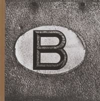 Large letter 'B' to center of gray textured cover of 'Belgicum', by Hannibal Books.
