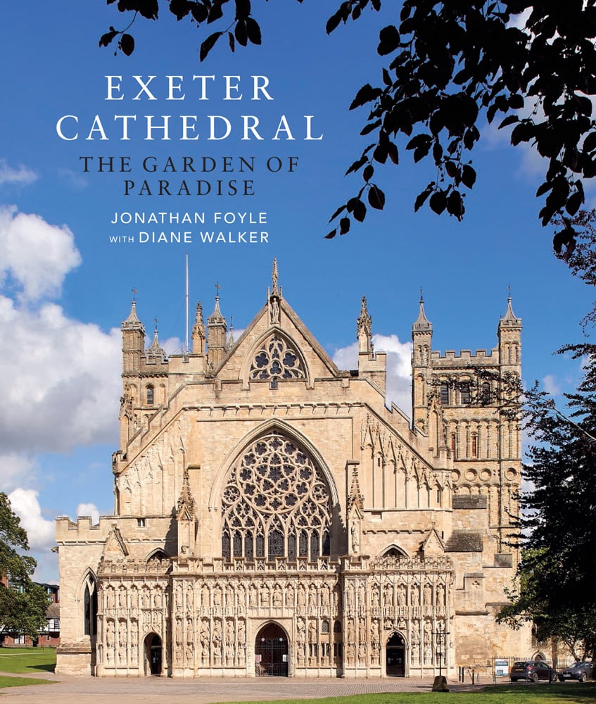 Exeter Cathedral under sunny blue sky, EXETER CATHEDRAL THE GARDEN OF PARADISE in white and green font above.