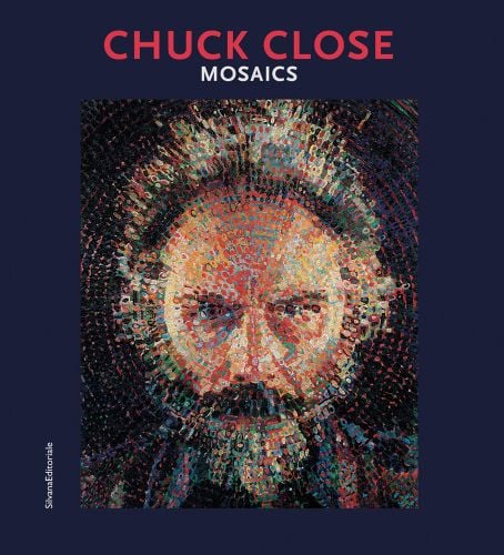 Photorealist painting Lucas Ii, 1987 by Chuck Close, on navy cover, CHUCK CLOSE MOSAICS in red and white font above.