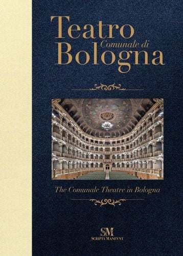 Grand interior of ceiling and seating area of Teatro Comunale di Bologna, Teatro Comunale di Bologna – The Comunale Theatre in Bologna in gold font above and below.