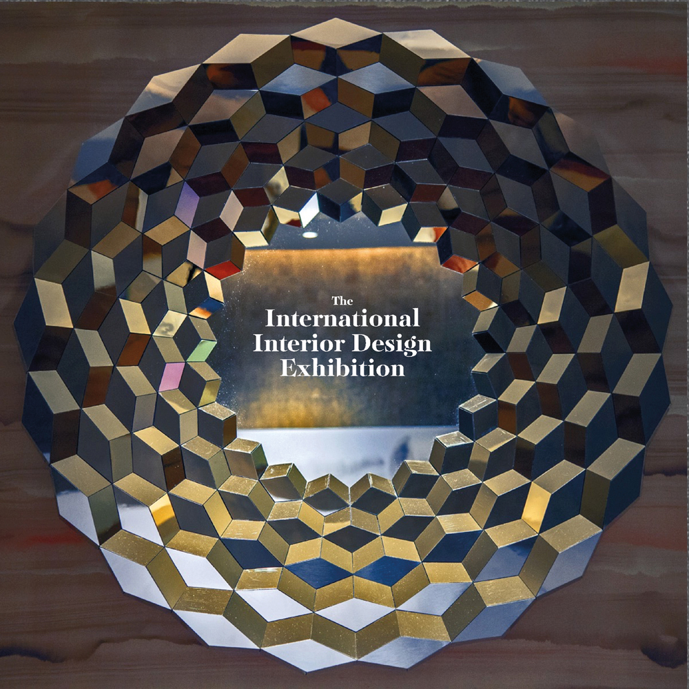 Geometric circular shape with hole, on cover of 'The International Interior Design Exhibition, Ilde', by Beta-Plus.