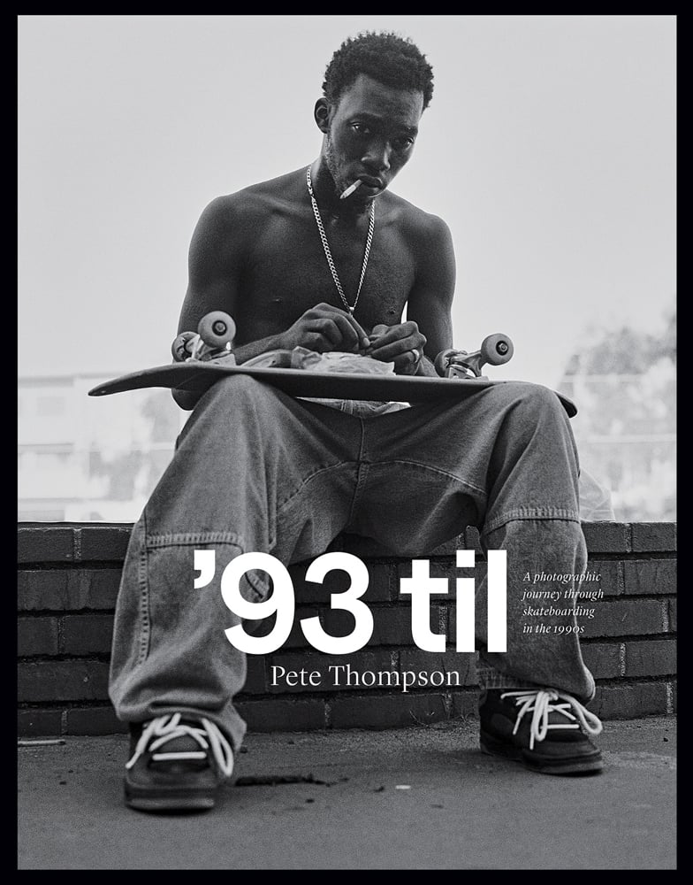 Book cover of Pete Thompson's 93 til, A Photographic Journey Through Skateboarding in the 1990s, with professional skateboarder Stevie Williams sitting on low brick wall smoking cigarette, with his board upside down on lap. Published by ORO Editions.