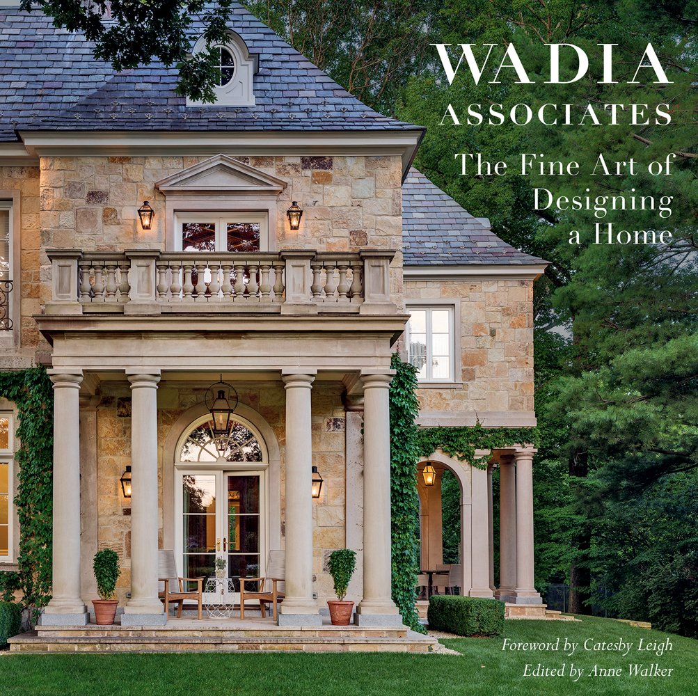 French American estate in Greenwich, Connecticut, columns to front entrance, WADIA ASSOCIATES The Fine Art of Designing a Home in white font to top right.