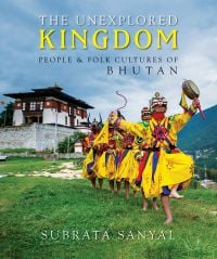 Book cover of The Unexplored Kingdom of Bhutan, with a line of people in bright yellow tradition dress. Published by Niyogi Books.