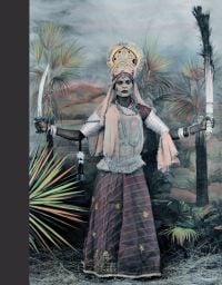 Book cover of Gauri Dancers, with Gauri dancer in traditional dress holding a sword and peacock feathers. Published by Mapin Publishing.