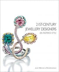 Small diamond encrusted jewelry piece with three larger gemstones, on cover of '21st-Century Jewellery Designers An Inspired Style', by ACC Art Books.