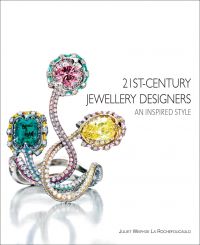 Small diamond encrusted jewelry piece with three larger gemstones, on cover of '21st-Century Jewellery Designers An Inspired Style', by ACC Art Books.