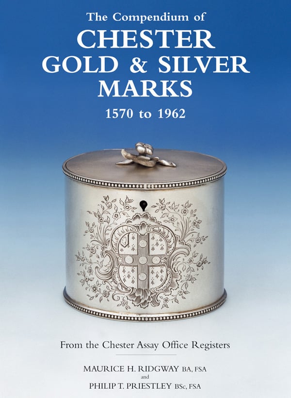 Silver tea caddy with crest to front, on cover of 'Compendium of Chester Gold & Silver Marks 1570-1962', by ACC Art Books.