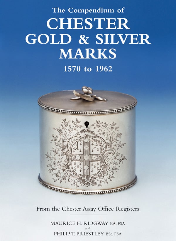 Silver tea caddy with crest to front, on cover of 'Compendium of Chester Gold & Silver Marks 1570-1962', by ACC Art Books.