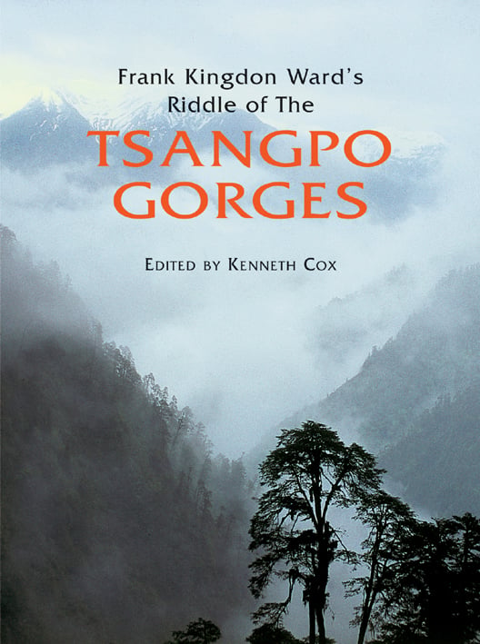 Atmospheric mountain landscape of Tibet, with low lying mist and tree silhouettes, on cover of 'Frank Kingdon Ward's Riddle of the Tsangpo Gorges', by ACC Art Books.