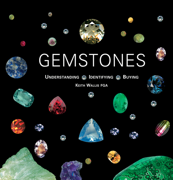 Arrangement of multi-coloured gemstones on black cover of 'Gemstones ', by ACC Art Books.