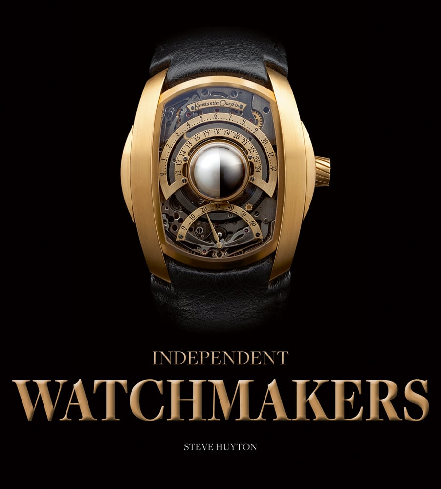 Black and gold Konstantin Chaykin Lunokhod Men's watch, on black cover of 'Independent Watchmakers', by ACC Art Books.