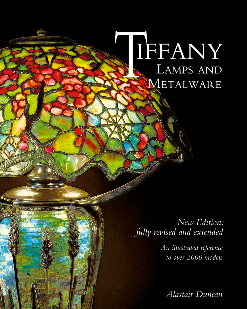 Stained Glass Lamp from early 1900s Tiffany Studio 'Cobweb on Wheat Mosaic Base', on cover of 'Tiffany Lamps and Metalware', by ACC Art Books.