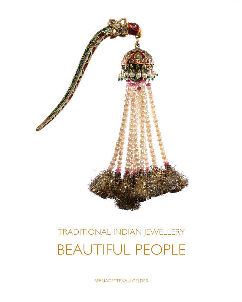 Decorative 19th century Turrah, turban ornament, on white cover of 'Traditional Indian Jewellery', by ACC Art Books.
