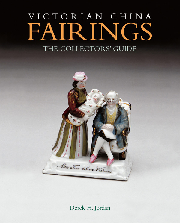 Porcelain ornament of man sitting in chair, women holding baby next to him, on cover of 'Victorian China Fairings', by ACC Art Books.