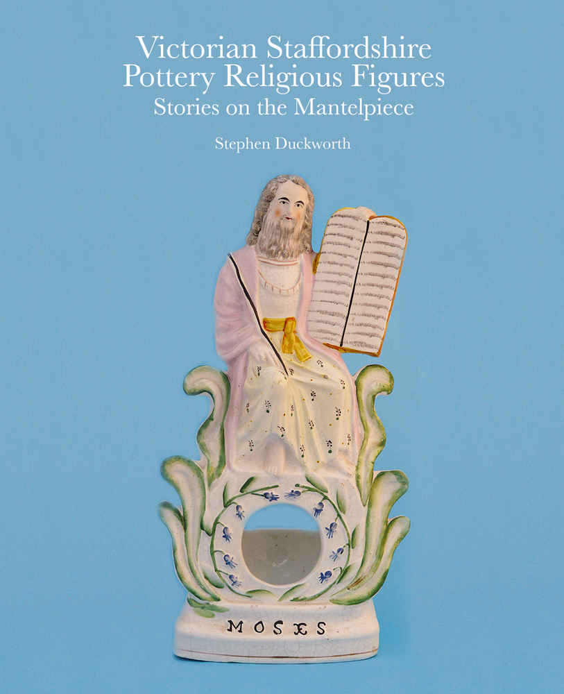 Book cover of Victorian Staffordshire Pottery Religious Figures, featuring a biblical figurine of 'Moses'. Published by ACC Art Books.