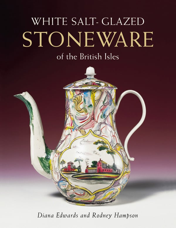 Stoneware jug painted with houses and trees near lake, on cover of 'White Salt-glazed Stoneware: of the British Isles', by ACC Art Books.