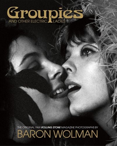Two female 'groupies', one with tongue near the others mouth, on cover of 'Groupies AND OTHER ELECTRIC LADIES', by ACC Art Books.