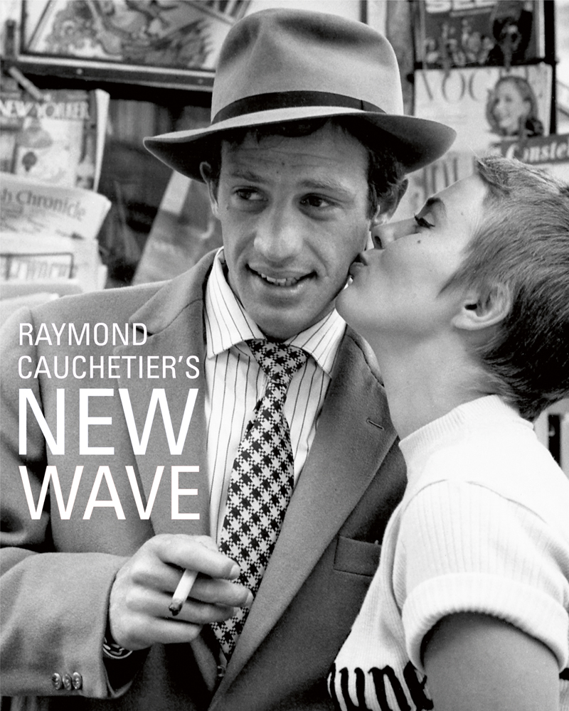 Book cover of Raymond Cauchetier's New Wave, featuring Jean Seberg kissing Jean Paul Belmondo's cheek on set from 1960 film 'Breathless'. Published by ACC Art Books.