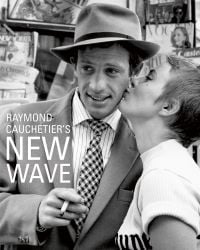 Book cover of Raymond Cauchetier's New Wave, featuring Jean Seberg kissing Jean Paul Belmondo's cheek on set from 1960 film 'Breathless'. Published by ACC Art Books.