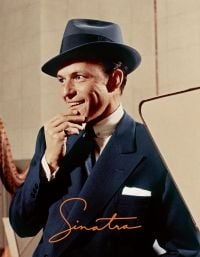 Book cover of Sinatra, featuring Frank Sinatra in a recording studio in 1956, in navy suit and hat. Published by ACC Art Books.
