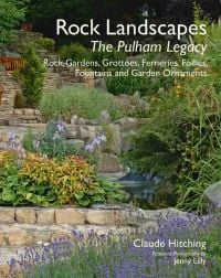 Elevated rock garden with flowering hostas, on cover of 'Rock Landscapes - The Pulham Legacy', by ACC Art Books.