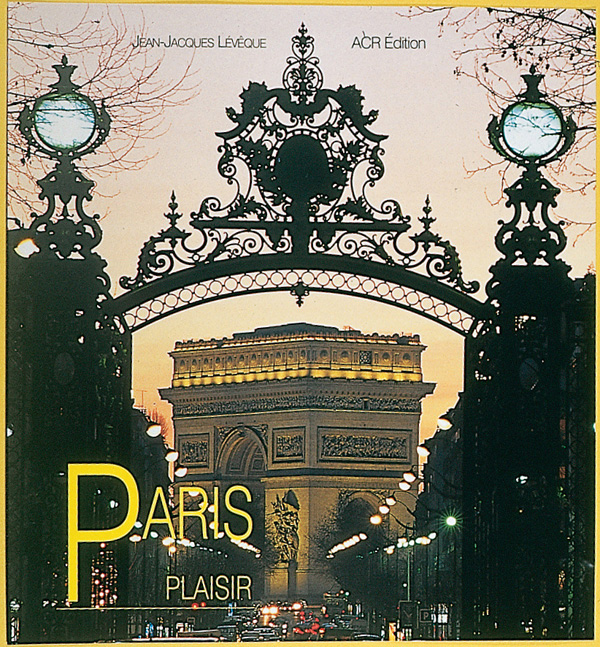 Black iron gates of Parc Monceau with Arc de Triomphe behind, on cover of 'Paris Plaisir', by ACR Edition.