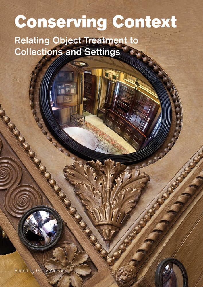 Book cover of Conserving Context: Relating Object Treatment to Collections and Settings, with a decoratively carved wood. Published by Archetype Publications.