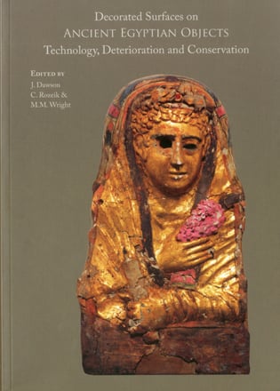 Book cover of Decorated Surfaces on Ancient Egyptian Objects: Technology, Deterioration and Conservation, with a gold figurine wearing robe. Published by Archetype Publications.