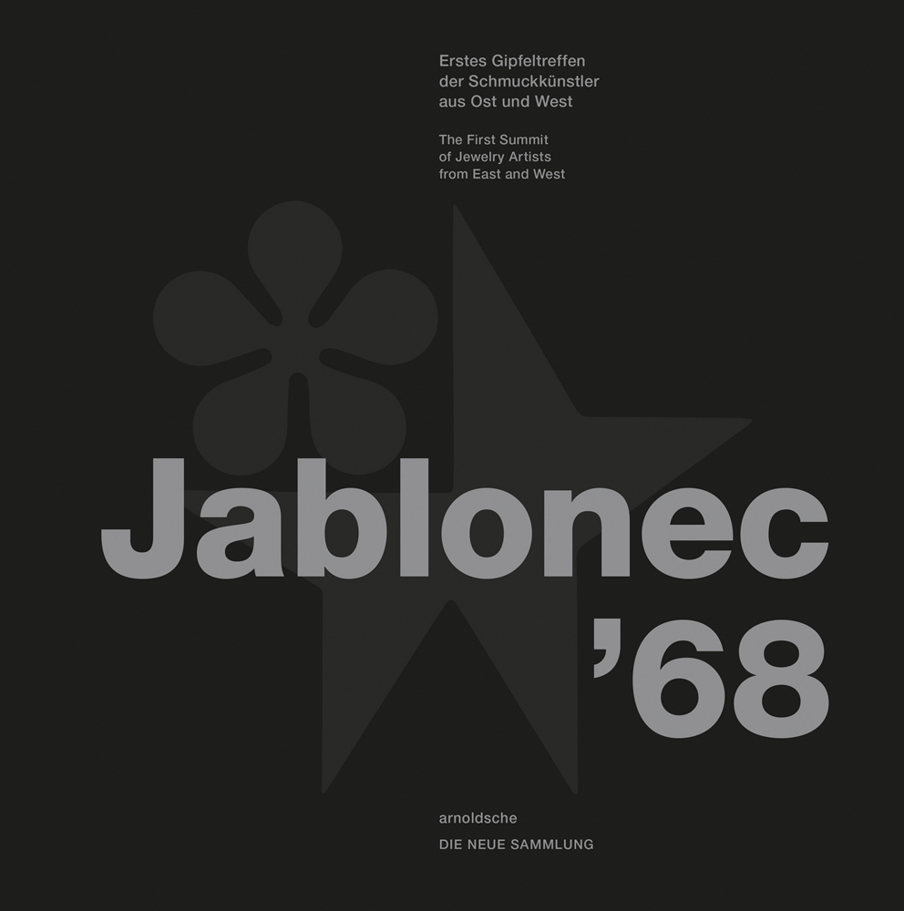 Jablonec '68 in grey font on black cover with flower and star shape in dark grey to centre