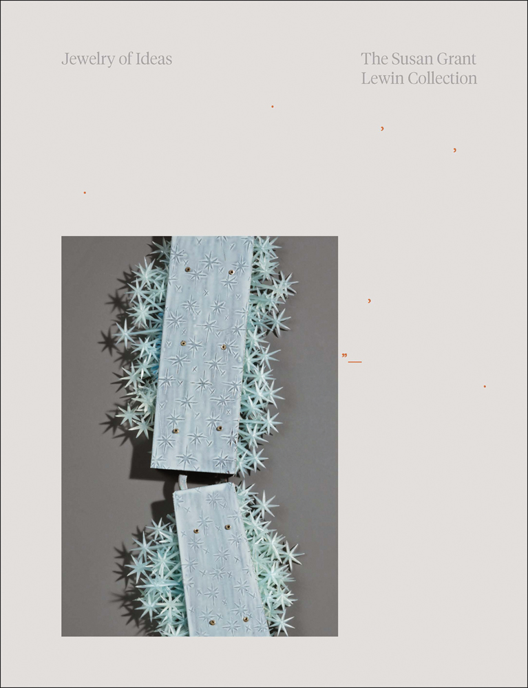 Pale blue oblong jewellery shapes with arrangement of small spiky stars on white cover, Jewelry of Ideas in pale grey