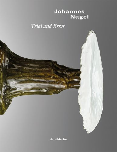 Rotated left image of glazed table sculpture, on grey cover, Johannes Nagel Trial and Error in white font above