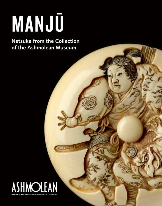Manj? netsuke depicting Minamoto Yoshitsune practising martial arts with a tengu demon, on black cover of 'Manju, Netsuke from the Collection of the Ashmolean Museum', by Ashmolean Museum.