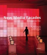 Interior of Media Facade Exhibition with wall of illuminated pink square screens on cover of 'New Media Facades: A Global Survey', by Avedition Gmbh.