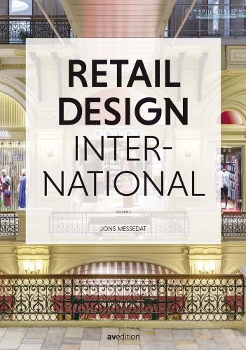 Interior of grand shopping mall, Retail Design International in black font on transparent cream box