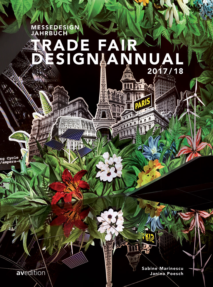 Card-board cut out of Eiffel Tower surrounded by lush green foliage and flowers, on cover of 'Trade Fair Design Annual 2017/18', by Avedition Gmbh.