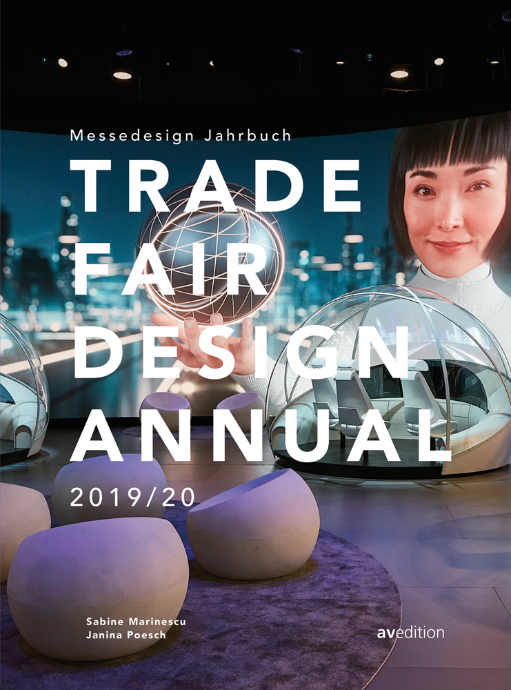 Futuristic design exhibition hall with sphere chairs and round glass pods, on cover of 'Trade Fair Design Annual 2019/20', by Avedition Gmbh.