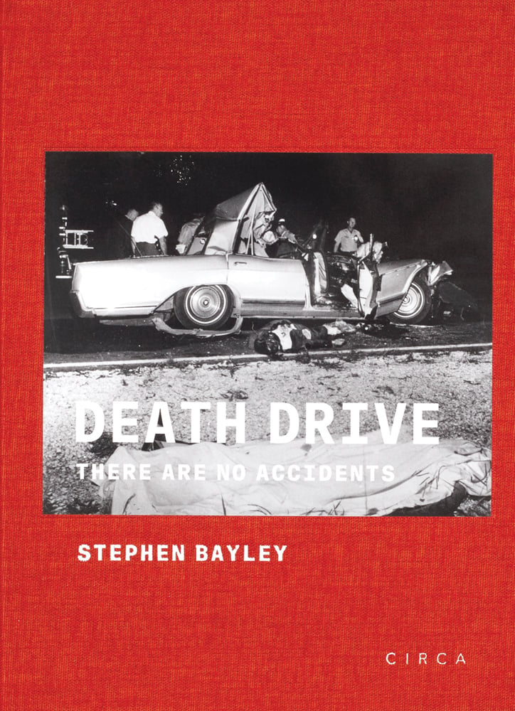 Black and white photo of smashed up car, body lying in road, on red cover, Death Drive in white font below