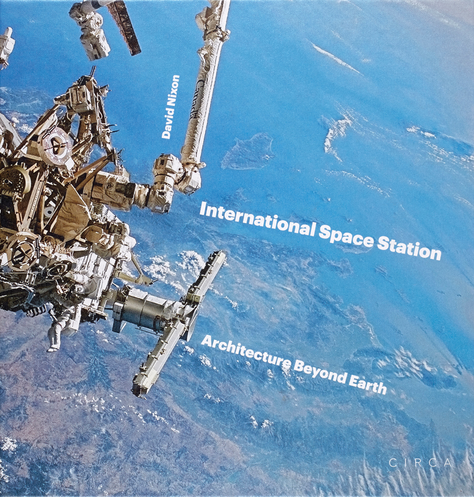 Space station in orbit, earth below, on cover of 'International Space Station, Architecture Beyond Earth', by Circa Press.