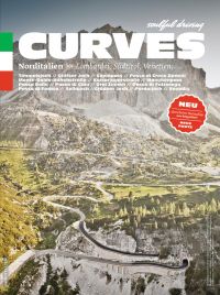 Snow topped mountainous landscape with winding road pass below, on cover of 'Curves: Northern Italy, Lombardy, South Tyrol, Veneto', by Delius Klasing.